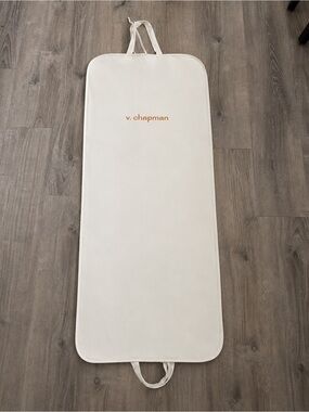 V. Chapman Garment Bag with Bow Tie Closures in Cream